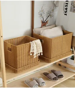 Woven storage basket with handles and tray base, ideal for office files and home organization.