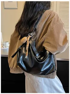 Minimalist casual oil wax leather shoulder bag for women, large capacity daily crossbody.