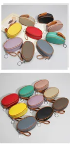 Genuine leather mini coin purse with zipper and keychain in multiple colors for women.