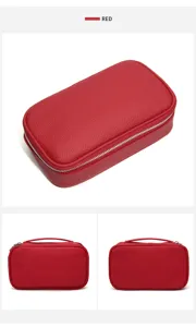 Red leather cosmetic bag detail view, portable travel toiletry organizer with handle.