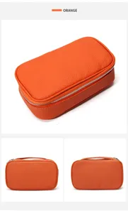Orange genuine leather cosmetic bag, portable travel large capacity toiletry organizer pouch.