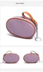 Mini oval leather coin purse with contrast color handle and keychain ring for women fashion accessories