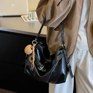 Casual oil wax leather shoulder bag for women, large capacity daily commuting crossbody bag.
