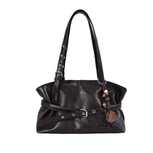Vintage braune Ledertasche für Damen, stilvolle elegante Achseltasche mit Metallösen.