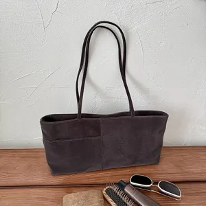 Chic suede shoulder bag for women, large capacity casual commuting tote bag with retro style.