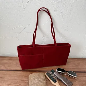 Red velvet shoulder bag for women, stylish casual large capacity commuter tote bag.