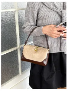 Detailed view of Korean style contrast pillow shoulder bag with plush surface and metal star charm.