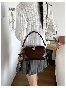 Korean style contrast color pillow shoulder bag with chain strap and cute plush charm for women.
