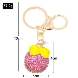 Goldener Metall Strass Mangosteen Schlüsselanhänger Anhänger mit Maßen für den täglichen Gebrauch.