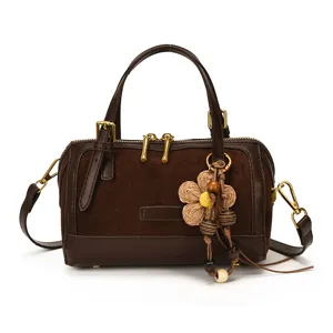 Retro brown suede boston handbag, chic pillow commuter shoulder bag with cute woven flower charm.