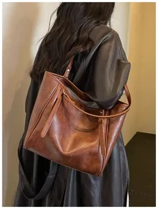 Minimalistische vintage grote dames leren schouder tote tas voor dagelijks woon-werkverkeer.