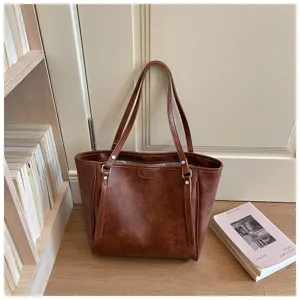 Klassieke bruine PU lederen shopper, elegante retro schoudertas voor werk en dag.