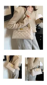 Details of the elegant quilted chain shoulder bag, showing premium texture and gold hardware.
