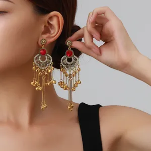 Retro rhinestone hollow long tassel earrings, bohemian style ethnic dangle jewelry detail shot.