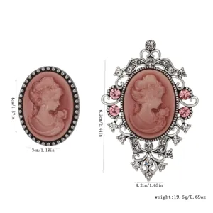 Vintage cameo brooch set with ornate crystal frame, elegant retro court style jewelry for women.
