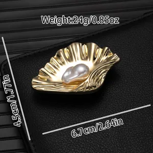 Gold shell pearl brooch detail view showcasing the exquisite metal texture and size measurements.