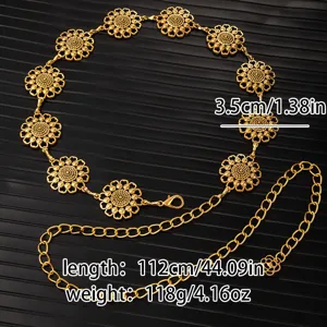 Vintage gold metal waist chain with embossed floral design and adjustable link details.