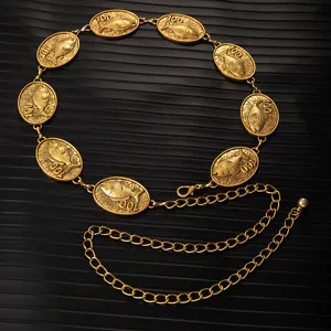 Vintage gold metal waist chain with embossed fish medallions and adjustable link belt for dress.