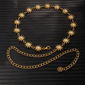 Vintage gold metal waist chain with rhinestone flower, adjustable dress accessory for women.