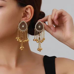Exquisite long tassel drop earrings with sparkling rhinestones and gold bell charms for women fashion.