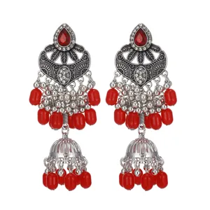 Boucles d'oreilles jhumka ethniques vintage longues à pampilles rouges style argent.