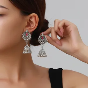 Exquisite ethnic long tassel drop earrings with red stone detail, perfect for elegant styles.