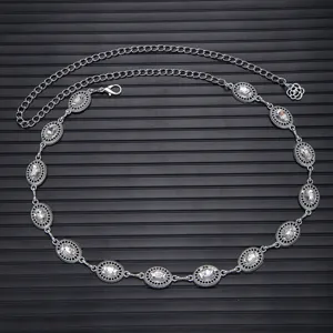 Vintage silver tone chain belt with clear oval rhinestones for women dress fashion accessory.