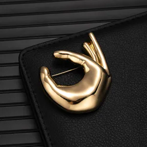 Exquisite gold hand shape alloy brooch fashion suit lapel pin elegant jewelry accessory