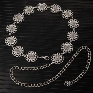 Detailed view of the silver metal flower waist chain, showing the intricate carved floral links.