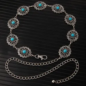 Vintage silver metal waist chain with carved floral medallions and blue turquoise stones for dresses.