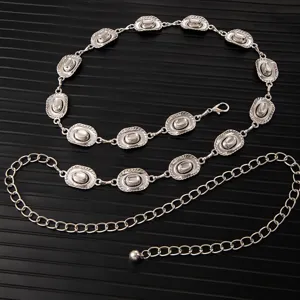 Silver metal waist chain detail showcasing vintage embossed cowboy hat plaques and adjustable link.