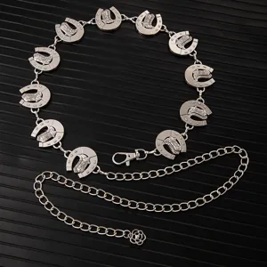 Detailed view of vintage silver metal waist chain with horseshoe and cowboy boot charms, adjustable.