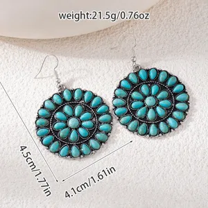 Bohemian retro turquoise disk earrings with intricate cluster design, vintage silver tone finish.