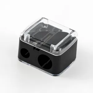 Dual hole makeup pencil sharpener with clear lid, portable cosmetic tool for eyebrow pencils.