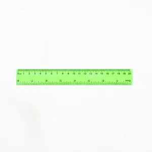 Transparent green 20cm plastic straight ruler detail shot showing dual metric and imperial scales.