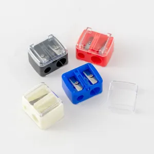Set of colorful dual hole pencil sharpeners with clear lids for school and makeup use.