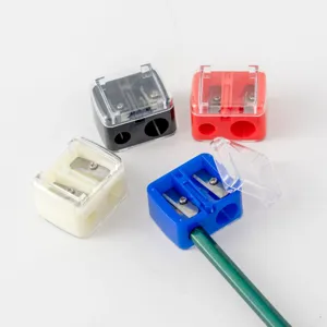 Detailed view of colorful dual-hole plastic pencil sharpeners with clear flip lids.