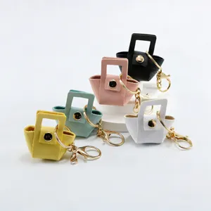 Schattige mini lederen handtas sleutelhanger macaron kleur leuke tas hanger.