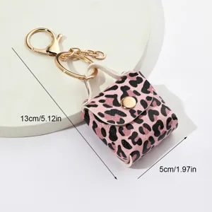 Portachiavi mini borsa con stampa leopardato rosa in pelle PU con accessori dorati