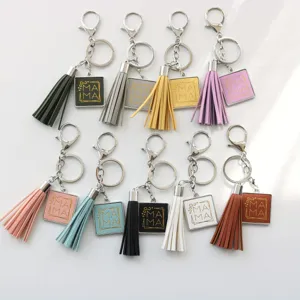 Kleurachtige lederen kwast sleutelhangers met MAMA opdruk, stijlvolle tasbedels en sleutelringen.