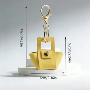 Gele lederen mini handtas sleutelhanger schattige tas charm met gouden accessoires