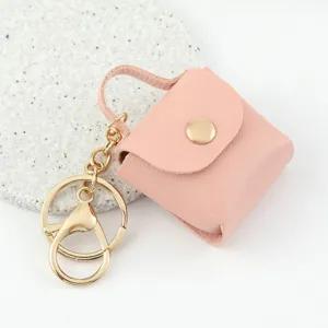 Grazioso portachiavi a borsa mini in pelle per chiavi auto, accessorio con pochette rosa stiloso.