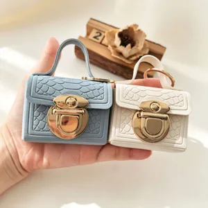 Mini krokodillenpatroon slot portemonnee sleutelhanger, draagbare oortelefoontas.