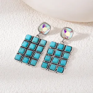 Bohemian vintage turquoise dangle earrings with geometric square stones and crystal stud detail.