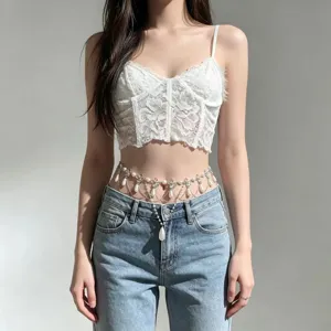 Y2K multi-layer pearl waist chain detail showcasing sparkling rhinestone tassel design.