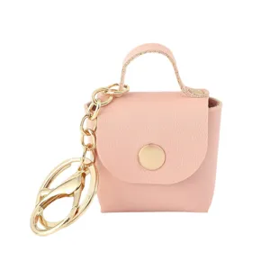 Grazioso portachiavi borsa mini in pelle rosa per chiavi auto e ciondolo per zaino carino.