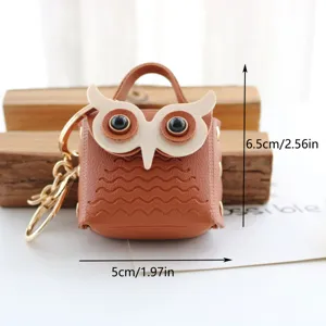Leuke uil lederen oortelefoon tasje mini sleutelhanger portemonnee hanger accessoire.