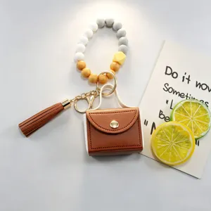 Portachiavi con perline in silicone e mini custodia in pelle con nappa, ciondolo per borsa.
