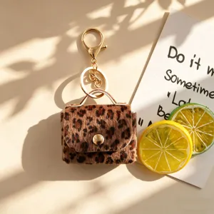 Portachiavi mini borsa in peluche stampa leopardo custodia cuffie portamonete