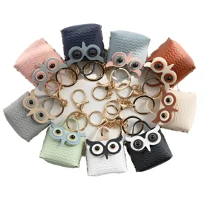 Leuke uil lederen oortelefoon tas sleutelhanger mini portemonnee, kleurrijke hanger.